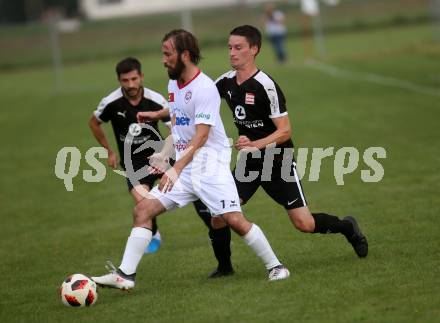 Fussball. Kaerntner Liga. Maria Saal gegen Dellach/Gail.  Roland Krenn (Maria Saal),  Mario Niescher (Dellach). Maria Saal, 24.8.2019.
Foto: Kuess
www.qspictures.net
---
pressefotos, pressefotografie, kuess, qs, qspictures, sport, bild, bilder, bilddatenbank