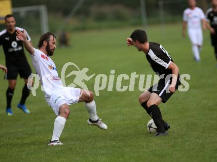 Fussball. Kaerntner Liga. Maria Saal gegen Dellach/Gail.  Roland Krenn (Maria Saal),   Mario Niescher (Dellach). Maria Saal, 24.8.2019.
Foto: Kuess
www.qspictures.net
---
pressefotos, pressefotografie, kuess, qs, qspictures, sport, bild, bilder, bilddatenbank