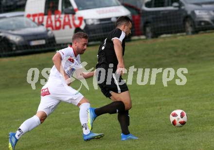 Fussball. Kaerntner Liga. Maria Saal gegen Dellach/Gail.  Christof Reichmann (Maria Saal),  Vahid Muharemovic (Dellach). Maria Saal, 24.8.2019.
Foto: Kuess
www.qspictures.net
---
pressefotos, pressefotografie, kuess, qs, qspictures, sport, bild, bilder, bilddatenbank