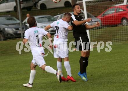Fussball. Kaerntner Liga. Maria Saal gegen Dellach/Gail.  Zoran Jorgic (Maria Saal),  Vahid Muharemovic (Dellach). Maria Saal, 24.8.2019.
Foto: Kuess
www.qspictures.net
---
pressefotos, pressefotografie, kuess, qs, qspictures, sport, bild, bilder, bilddatenbank