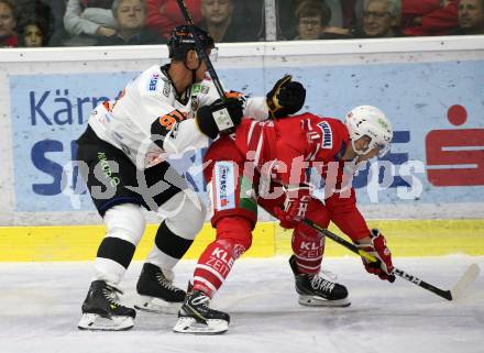 EBEL. Eishockey Bundesliga. KAC gegen	Moser Medical Graz99ers. Lukas Haudum,  (KAC), Oliver Setzinger (Graz). Klagenfurt, am 6.10.2019.
Foto: Kuess
www.qspictures.net

---
pressefotos, pressefotografie, kuess, qs, qspictures, sport, bild, bilder, bilddatenbank