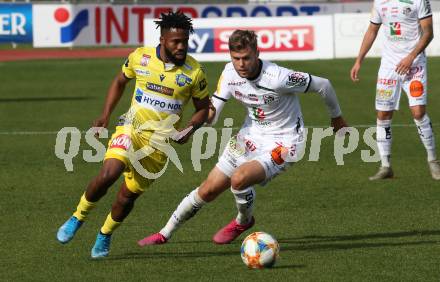 Fussball Bundesliga. RZ Pellets WAC gegen spusu SKN St. Poelten. Dominik Baumgartner, (WAC), George Davies  (St. Poelten). Wolfsberg, am 6.10.2019.
Foto: Kuess
www.qspictures.net

---
pressefotos, pressefotografie, kuess, qs, qspictures, sport, bild, bilder, bilddatenbank