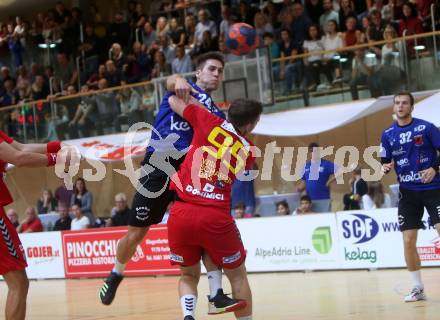 Handball Bundesliga. HLA. SC Kelag Ferlach gegen UHK Krems. Mladan JOvanovic,  (SCF), Marko Simek (Krems). Ferlach, am 28.9.2019.
Foto: Kuess
---
pressefotos, pressefotografie, kuess, qs, qspictures, sport, bild, bilder, bilddatenbank