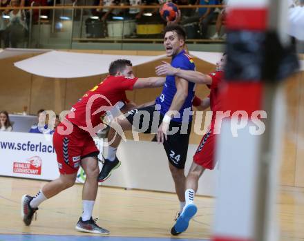 Handball Bundesliga. HLA. SC Kelag Ferlach gegen UHK Krems. Mladan Jovanovic,  (SCF), Marko Simek (Krems). Ferlach, am 28.9.2019.
Foto: Kuess
---
pressefotos, pressefotografie, kuess, qs, qspictures, sport, bild, bilder, bilddatenbank
