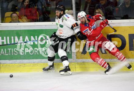 EBEL. Eishockey Bundesliga. KAC gegen	Moser Medical Graz99ers. Martin Schumnig,  (KAC), Travis Oleksuk (Graz). Klagenfurt, am 6.10.2019.
Foto: Kuess
www.qspictures.net

---
pressefotos, pressefotografie, kuess, qs, qspictures, sport, bild, bilder, bilddatenbank