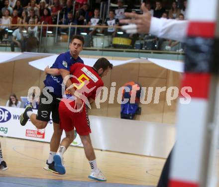 Handball Bundesliga. HLA. SC Kelag Ferlach gegen UHK Krems. Mladan Jovanovic,  (SCF), Leonard Schafler (Krems). Ferlach, am 28.9.2019.
Foto: Kuess
---
pressefotos, pressefotografie, kuess, qs, qspictures, sport, bild, bilder, bilddatenbank