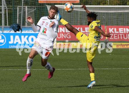 Fussball Bundesliga. RZ Pellets WAC gegen spusu SKN St. Poelten. Dominik Baumgartner,  (WAC), George Davies (St. Poelten). Wolfsberg, am 6.10.2019.
Foto: Kuess
www.qspictures.net

---
pressefotos, pressefotografie, kuess, qs, qspictures, sport, bild, bilder, bilddatenbank