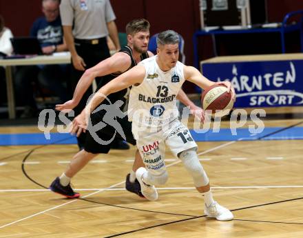 Basketball 2. Bundesliga. Grunddurchgang 4. Runde. Woerthersee Piraten gegen Guessing/Jennersdorf Blackbirds. Ziga Erculj (Piraten), Philipp Horvath (Blackbirds). Klagenfurt, am 12.10.2019.
Foto: Kuess
www.qspictures.net

---
pressefotos, pressefotografie, kuess, qs, qspictures, sport, bild, bilder, bilddatenbank