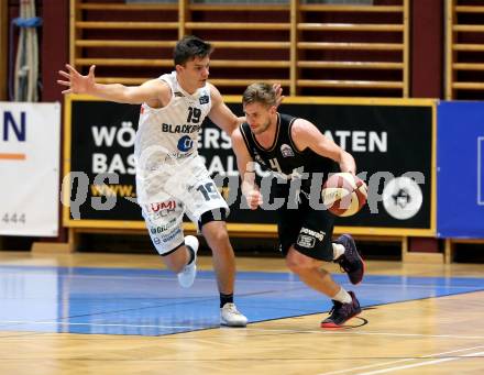 Basketball 2. Bundesliga. Grunddurchgang 4. Runde. Woerthersee Piraten gegen Guessing/Jennersdorf Blackbirds. Ziga Erculj (Piraten), Jakob Ernst (Blackbirds). Klagenfurt, am 12.10.2019.
Foto: Kuess
www.qspictures.net

---
pressefotos, pressefotografie, kuess, qs, qspictures, sport, bild, bilder, bilddatenbank