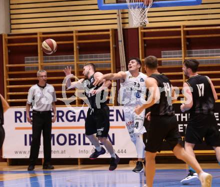 Basketball 2. Bundesliga. Grunddurchgang 4. Runde. Woerthersee Piraten gegen Guessing/Jennersdorf Blackbirds. Ziga Erculj (Piraten), Christoph Astl (Blackbirds). Klagenfurt, am 12.10.2019.
Foto: Kuess
www.qspictures.net

---
pressefotos, pressefotografie, kuess, qs, qspictures, sport, bild, bilder, bilddatenbank