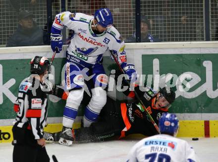 EBEL. Eishockey Bundesliga. EC VSV gegen Moser Medical Graz99ers.   Alen Bibic, (VSV), Clemens Krainz  (Graz). Villach, am 13.10.2019.
Foto: Kuess
www.qspictures.net
---
pressefotos, pressefotografie, kuess, qs, qspictures, sport, bild, bilder, bilddatenbank