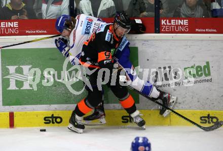 EBEL. Eishockey Bundesliga. EC VSV gegen Moser Medical Graz99ers.   Chris Collins, (VSV), Oliver Setzinger  (Graz). Villach, am 13.10.2019.
Foto: Kuess
www.qspictures.net
---
pressefotos, pressefotografie, kuess, qs, qspictures, sport, bild, bilder, bilddatenbank