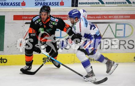 EBEL. Eishockey Bundesliga. EC VSV gegen Moser Medical Graz99ers.   Bernd Wolf,  (VSV), Travis Oleksuk (Graz). Villach, am 13.10.2019.
Foto: Kuess
www.qspictures.net
---
pressefotos, pressefotografie, kuess, qs, qspictures, sport, bild, bilder, bilddatenbank