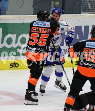 EBEL. Eishockey Bundesliga. EC VSV gegen Moser Medical Graz99ers.   Brodie Reid,  (VSV), Trevor Hamilton (Graz). Villach, am 13.10.2019.
Foto: Kuess
www.qspictures.net
---
pressefotos, pressefotografie, kuess, qs, qspictures, sport, bild, bilder, bilddatenbank