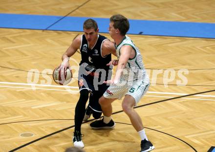Basketball 2. Bundesliga. Grunddurchgang 5. Runde. KOS Celovec gegen BBC Nord Dragonz. Andi Smrtnik (KOS Celovec), Filip Mileta (Nord Dragonz). Klagenfurt, am 19.10.2019.
Foto: Kuess
www.qspictures.net

---
pressefotos, pressefotografie, kuess, qs, qspictures, sport, bild, bilder, bilddatenbank
