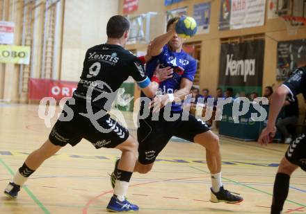 HLA. Handball BUndesliga. SC Kelag Ferlach gegen HSG Remus Baernbach/Koeflach. Mladan Jovanovic,  (SCF),  Filip Bonic (Baernbach/Koeflach). Ferlach, am 12.10.2019.
Foto: Kuess
www.qspictures.net

---
pressefotos, pressefotografie, kuess, qs, qspictures, sport, bild, bilder, bilddatenbank
