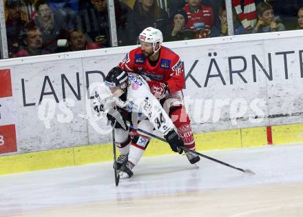 EBEL. Eishockey Bundesliga. KAC gegen	HC Orli Znojmo. Thomas Koch,  (KAC), Vladimir Oscadal (Znojmo). Klagenfurt, am 25.10.2019.
Foto: Kuess
www.qspictures.net

---
pressefotos, pressefotografie, kuess, qs, qspictures, sport, bild, bilder, bilddatenbank