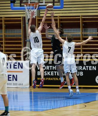 Basketball Zweite Liga 2019/2020. Grunddurchgang 6. Runde. Woerthersee Piraten gegen Deutsch Wagram Alligators. Tevz Ruzic, Lukas Simoner (Piraten), Elias Wlasak (Alligators). Klagenfurt, am 26.10.2019.
Foto: Kuess
www.qspictures.net

---
pressefotos, pressefotografie, kuess, qs, qspictures, sport, bild, bilder, bilddatenbank