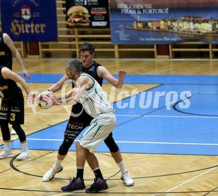 Basketball Zweite Liga 2019/2020. Grunddurchgang 9. Runde. KOS Celovec gegen  Guessing/Jennersdorf Blackbirds 	.  Ales Primc,  (KOS Celovec),  Sebastian Koch (Blackbirds). Klagenfurt, am 9.11.2019.
Foto: Kuess
www.qspictures.net

---
pressefotos, pressefotografie, kuess, qs, qspictures, sport, bild, bilder, bilddatenbank
