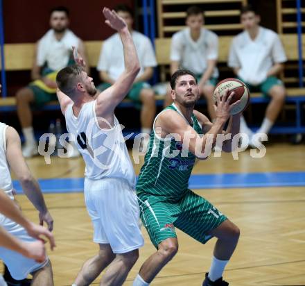 Basketball Zweite Liga 2019/2020. Grunddurchgang 8. Runde. Woerthersee Piraten gegen KOS Celovec.  Ziga Erculj (Piraten), Tiso Cvetkovic (KOS Celovec). Klagenfurt, am 16.11.2019.
Foto: Kuess
www.qspictures.net

---
pressefotos, pressefotografie, kuess, qs, qspictures, sport, bild, bilder, bilddatenbank