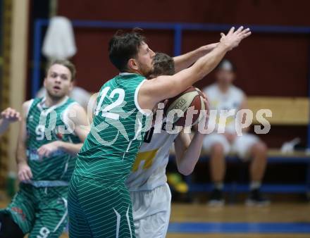 Basketball Zweite Liga 2019/2020. Grunddurchgang 8. Runde. Woerthersee Piraten gegen KOS Celovec. Tevz Ruzic (Piraten), Tiso Cvetkovic (KOS Celovec). Klagenfurt, am 16.11.2019.
Foto: Kuess
www.qspictures.net

---
pressefotos, pressefotografie, kuess, qs, qspictures, sport, bild, bilder, bilddatenbank
