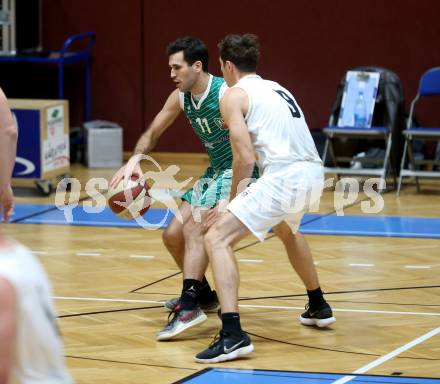 Basketball Zweite Liga 2019/2020. Grunddurchgang 8. Runde. Woerthersee Piraten gegen KOS Celovec. Simon Finzgar (Piraten), Toman Feinig (KOS Celovec). Klagenfurt, am 16.11.2019.
Foto: Kuess
www.qspictures.net

---
pressefotos, pressefotografie, kuess, qs, qspictures, sport, bild, bilder, bilddatenbank