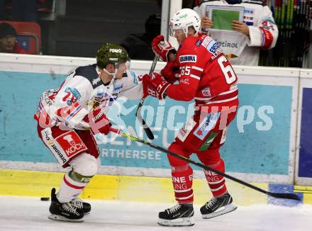 EBEL. Eishockey Bundesliga. KAC gegen	HCB Suedtirol Alperia. Michael Kernberger,  (KAC), Dennis Robertson (Bozen). Klagenfurt, am 24.11.2019.
Foto: Kuess
www.qspictures.net

---
pressefotos, pressefotografie, kuess, qs, qspictures, sport, bild, bilder, bilddatenbank