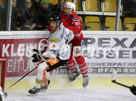 EBEL. Eishockey Bundesliga. KAC gegen	Dornbirn Bulldogs. Andrew Jacob Kozek,  (KAC),  Keaton Fraser Ellerby (Dornbirn). Klagenfurt, am 1.12.2019.
Foto: Kuess
www.qspictures.net

---
pressefotos, pressefotografie, kuess, qs, qspictures, sport, bild, bilder, bilddatenbank
