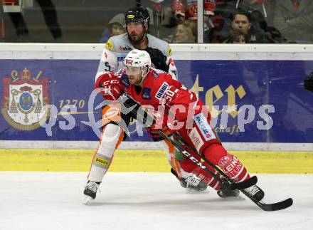 EBEL. Eishockey Bundesliga. KAC gegen	Dornbirn Bulldogs. Matthew Neal, (KAC),  Mikko Vainonen  (Dornbirn). Klagenfurt, am 1.12.2019.
Foto: Kuess
www.qspictures.net

---
pressefotos, pressefotografie, kuess, qs, qspictures, sport, bild, bilder, bilddatenbank