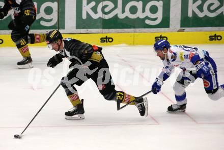 EBEL. Eishockey Bundesliga. EC VSV gegen spusu Vienna Capitals. Patrick Spannring,  (VSV), Ty Loney  (Vienna Capitals). Villach, am 8.12.2019.
Foto: Kuess
www.qspictures.net
---
pressefotos, pressefotografie, kuess, qs, qspictures, sport, bild, bilder, bilddatenbank