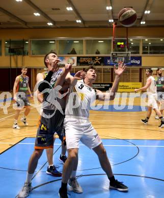 Basketball OEBV Cup. Austria Cup. Woerthersee Piraten gegen Klosterneuburg Dukes. Simon Finzgar (Piraten), Maximilian Hopfgartner (Klosterneuburg). Klagenfurt, am 11.12.2019.
Foto: Kuess
www.qspictures.net

---
pressefotos, pressefotografie, kuess, qs, qspictures, sport, bild, bilder, bilddatenbank