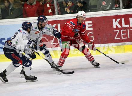 EBEL. Eishockey Bundesliga. KAC gegen	Hydro Fehervar AV 19. Ganahl Manuel (KAC), Busenius Dylan,  Yogan Andrew Michael (Alba Volan). Klagenfurt, am 15.12.2019.
Foto: Kuess
www.qspictures.net

---
pressefotos, pressefotografie, kuess, qs, qspictures, sport, bild, bilder, bilddatenbank