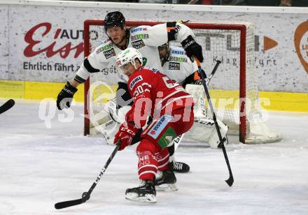 EBEL. Eishockey Bundesliga. KAC gegen	Moser Medical Graz99ers. Matthew Neal,  (KAC), Peter Robin Weihager (Graz). Klagenfurt, am 28.12.2019.
Foto: Kuess
www.qspictures.net

---
pressefotos, pressefotografie, kuess, qs, qspictures, sport, bild, bilder, bilddatenbank