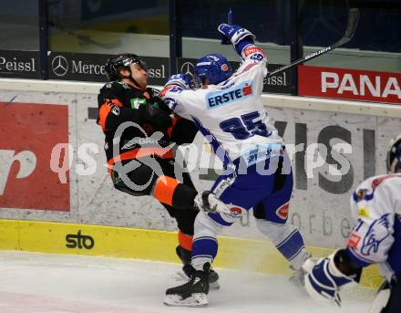 EBEL. Eishockey Bundesliga. VSV gegen Moser Medical Graz99ers. Mark Anthony Cundari,  (VSV), Matt Garbowski  (Graz). Villach, am 3.1.2020.
Foto: Kuess
www.qspictures.net
---
pressefotos, pressefotografie, kuess, qs, qspictures, sport, bild, bilder, bilddatenbank