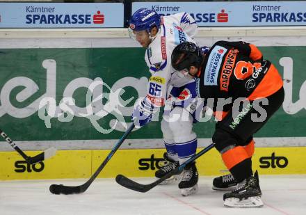 EBEL. Eishockey Bundesliga. VSV gegen Moser Medical Graz99ers.  Mark Anthony Cundari,  (VSV), Matt Garbowski (Graz). Villach, am 3.1.2020.
Foto: Kuess
www.qspictures.net
---
pressefotos, pressefotografie, kuess, qs, qspictures, sport, bild, bilder, bilddatenbank