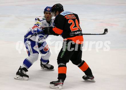 EBEL. Eishockey Bundesliga. VSV gegen Moser Medical Graz99ers.  Mark Anthony Cundari, (VSV),  Joakim Hillding (Graz). Villach, am 3.1.2020.
Foto: Kuess
www.qspictures.net
---
pressefotos, pressefotografie, kuess, qs, qspictures, sport, bild, bilder, bilddatenbank