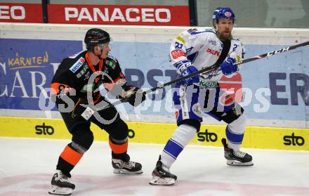 EBEL. Eishockey Bundesliga. VSV gegen Moser Medical Graz99ers.  Marko Poeyhoenen,  (VSV), Oliver Setzinger (Graz). Villach, am 3.1.2020.
Foto: Kuess
www.qspictures.net
---
pressefotos, pressefotografie, kuess, qs, qspictures, sport, bild, bilder, bilddatenbank