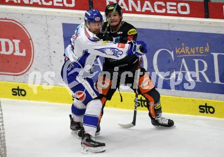 EBEL. Eishockey Bundesliga. VSV gegen Dornbirn Bulldogs.  Marko Poeyhoenen,  (VSV), Emilio Romig (Dornbirn). Villach, am 31.1.2020.
Foto: Kuess
www.qspictures.net
---
pressefotos, pressefotografie, kuess, qs, qspictures, sport, bild, bilder, bilddatenbank