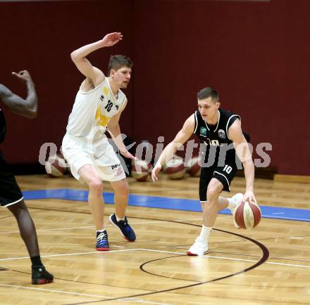Basketball Zweite Liga 2019/2020. Grunddurchgang 20. Runde. Woerthersee Piraten gegen Raiders Tirol. Tevz Ruzic (Piraten), Roman Skvasik (Tirol). Klagenfurt, am 1.2.2020.
Foto: Kuess
www.qspictures.net

---
pressefotos, pressefotografie, kuess, qs, qspictures, sport, bild, bilder, bilddatenbank