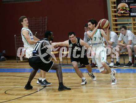 Basketball Zweite Liga 2019/2020. Play Down 1. Runde. KOS Celovec gegen  Raiders Tirol. Andi Smrtnik, Volkan Oezdemir (KOS Celovec), John Franklyn Gardiner, Nemanja Markovic (Tirol). Klagenfurt, am 22.2.2020.
Foto: Kuess
www.qspictures.net

---
pressefotos, pressefotografie, kuess, qs, qspictures, sport, bild, bilder, bilddatenbank