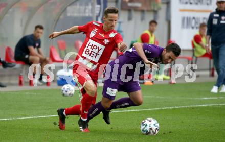 Fussball. 2. Liga. SK Austria Klagenfurt gegen Grazer AK 1902.  Polydoros Gkezos (Klagenfurt),  Gerald Nutz (Graz). Klagenfurt, am 23.6.2020.
Foto: Kuess
www.qspictures.net
---
pressefotos, pressefotografie, kuess, qs, qspictures, sport, bild, bilder, bilddatenbank