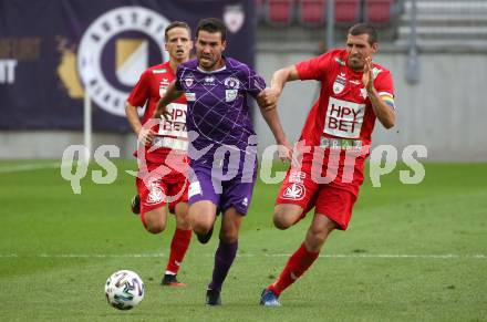 Fussball. 2. Liga. SK Austria Klagenfurt gegen Grazer AK 1902. Polydoros Gkezos, (Klagenfurt),  Marco Perchtold (Graz). Klagenfurt, am 23.6.2020.
Foto: Kuess
www.qspictures.net
---
pressefotos, pressefotografie, kuess, qs, qspictures, sport, bild, bilder, bilddatenbank