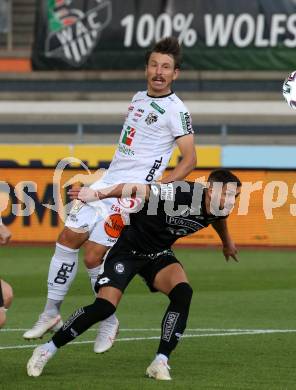 Fussball. Tipico Bundesliga. RZ Pellets WAC gegen SK Sturm Graz. Christopher Wernitznig,  (WAC),  Emanuel Sakic (Graz). Wolfsberg, am 24.6.2020.
Foto: Kuess
www.qspictures.net

---
pressefotos, pressefotografie, kuess, qs, qspictures, sport, bild, bilder, bilddatenbank