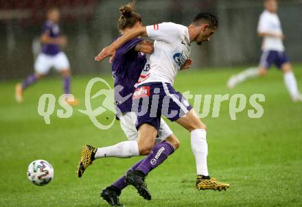 Fussball 2. Liga. SK Austria Klagenfurt gegen Young Violets Austria Wien.  Patrick Greil,  (Klagenfurt), Can Keles (Wien). Klagenfurt, am 25.9.2020.
Foto: Kuess
www.qspictures.net
---
pressefotos, pressefotografie, kuess, qs, qspictures, sport, bild, bilder, bilddatenbank