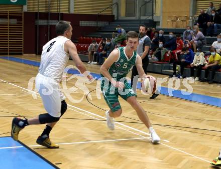 Basketball Zweite Liga 2020/2021. Grunddurchgang 1. Runde. Woerthersee Piraten gegen KOS Celovec.  Samo Udrih (Piraten), Andi Smrtnik (KOS Celovec). Klagenfurt, am 26.9.2020.
Foto: Kuess
www.qspictures.net

---
pressefotos, pressefotografie, kuess, qs, qspictures, sport, bild, bilder, bilddatenbank