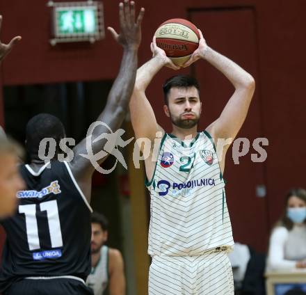 Basketball Zweite Liga 2020/2021. Grunddurchgang 2. Runde. KOS Celovec gegen RAIDERS Tirol. Marin Sliskovic (KOS Celovec), John Franklyn Gardiner (Tirol). Klagenfurt, am 3.10.2020.
Foto: Kuess
www.qspictures.net

---
pressefotos, pressefotografie, kuess, qs, qspictures, sport, bild, bilder, bilddatenbank