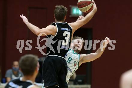 Basketball Zweite Liga 2020/2021. Grunddurchgang 2. Runde. KOS Celovec gegen RAIDERS Tirol. Tim Huber (KOS Celovec), Marcis Benefelds (Tirol). Klagenfurt, am 3.10.2020.
Foto: Kuess
www.qspictures.net

---
pressefotos, pressefotografie, kuess, qs, qspictures, sport, bild, bilder, bilddatenbank