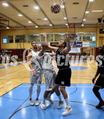 Basketball Zweite Liga 2020/2021. Grunddurchgang 2. Runde. KOS Celovec gegen RAIDERS Tirol. Lovro Fizuleto, Marin Sliskovic (KOS Celovec), Oliver Vujakovic (Tirol). Klagenfurt, am 3.10.2020.
Foto: Kuess
www.qspictures.net

---
pressefotos, pressefotografie, kuess, qs, qspictures, sport, bild, bilder, bilddatenbank