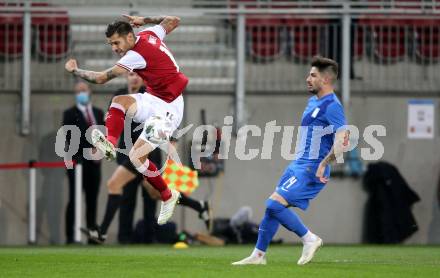 Fussball Laenderspiel. Oesterreich gegen Griechenland. Christopher Trimmel, (Oesterreich), Taxiarchis Fountas  (Griechenland). Klagenfurt Woerthersee Stadion, am 7.10.2020.
Foto: Kuess
www.qspictures.net
---
pressefotos, pressefotografie, kuess, qs, qspictures, sport, bild, bilder, bilddatenbank