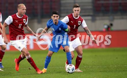 Fussball Laenderspiel. Oesterreich gegen Griechenland. Raphael Holzhauser, Marco Friedl,  (Oesterreich), Petros Mantalos (Griechenland). Klagenfurt Woerthersee Stadion, am 7.10.2020.
Foto: Kuess
www.qspictures.net
---
pressefotos, pressefotografie, kuess, qs, qspictures, sport, bild, bilder, bilddatenbank